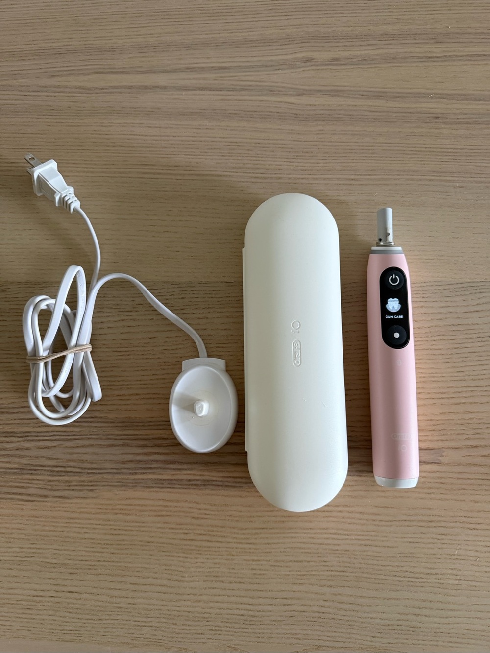 Pink Rechargeable Electric Toothbrush Handle with White Travel Case